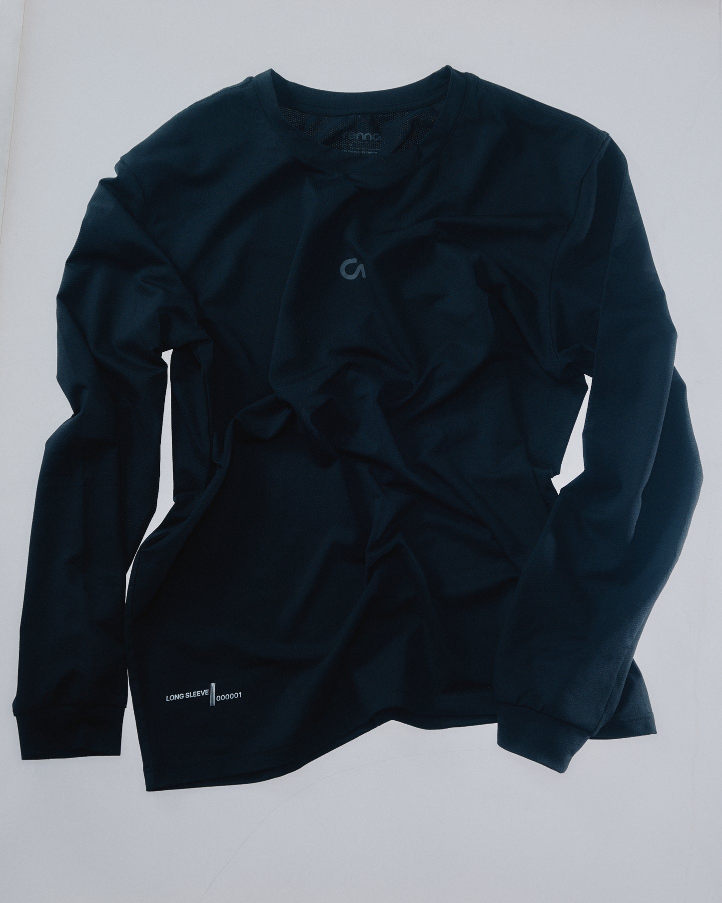 Athlete wearing Renna LS 000001 long sleeve running tee on the run
